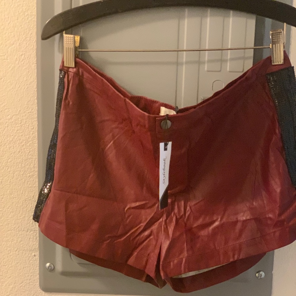 Red vegan leather shorts with sequins